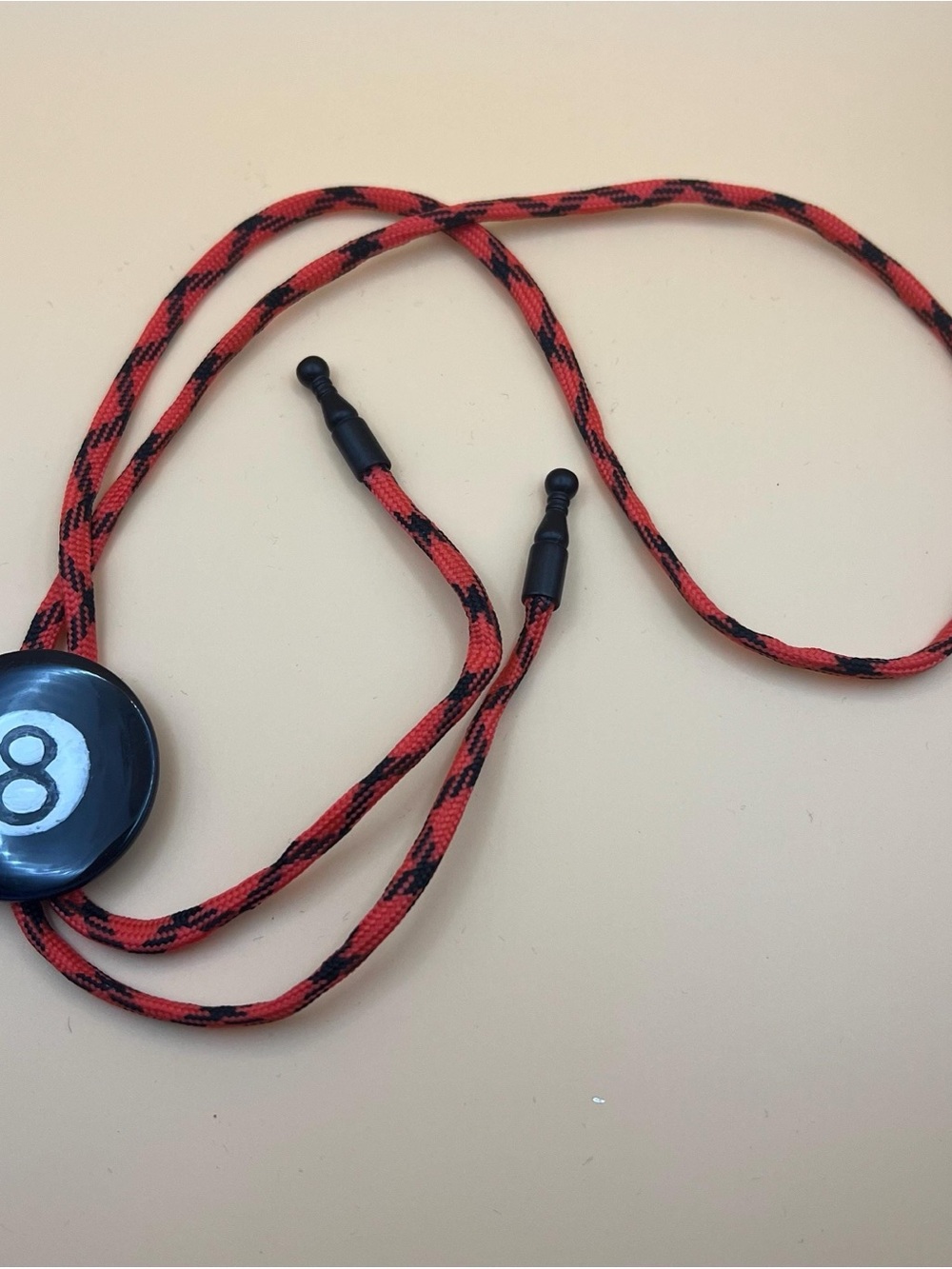 Red and Black Bolo Tie with 8-Ball Accent